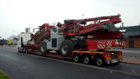 transport of Holmer Terra Felis machine by deeploader trailer